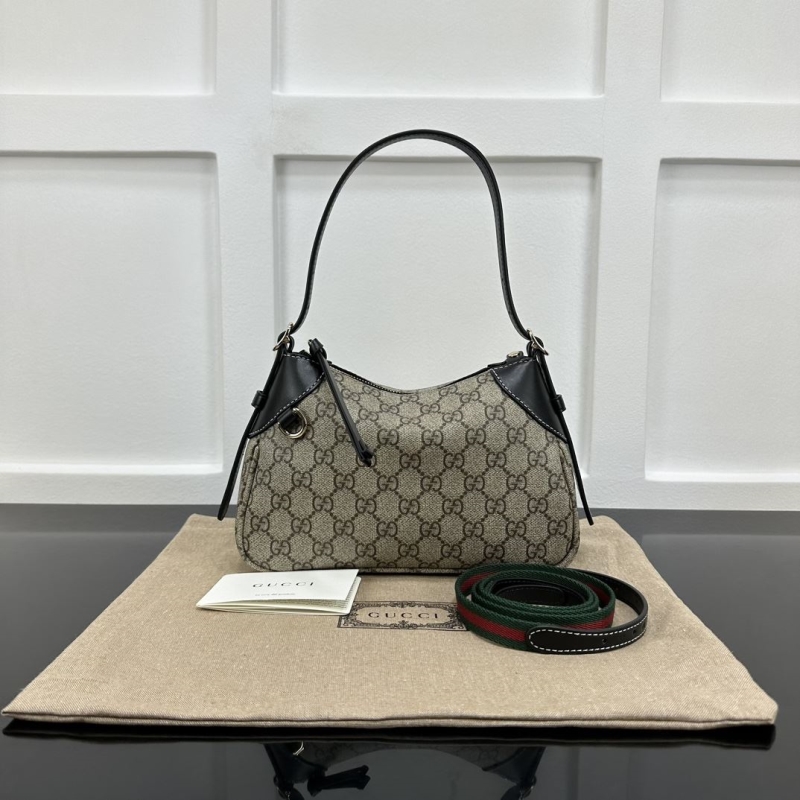 G*u*i top handle bags